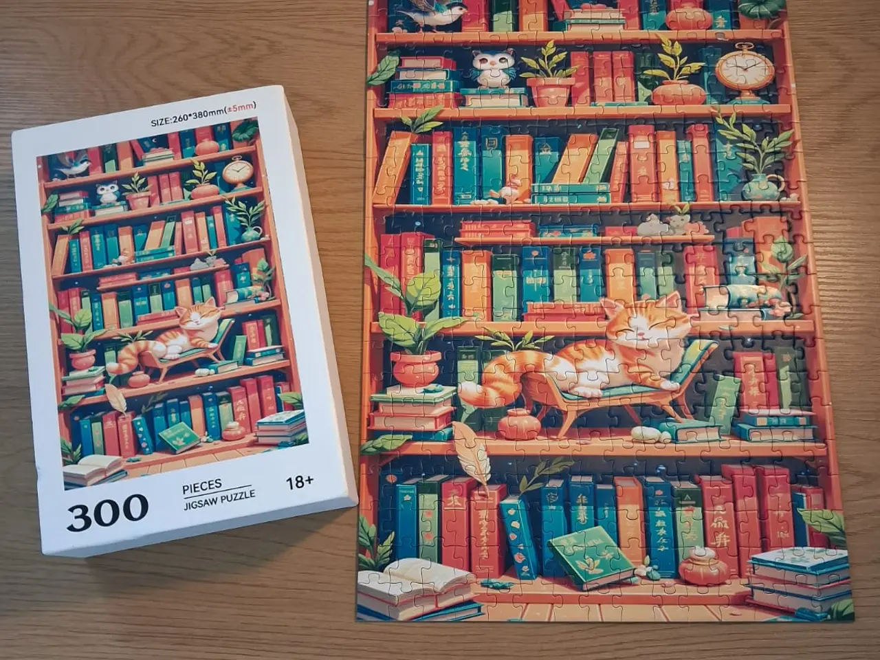 Billede 1 - Puslespil 300 stk, kat i bogreol, komplet