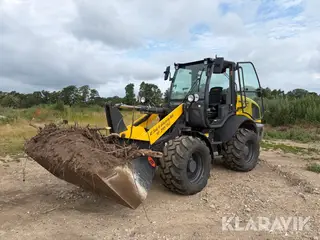 Gummiged New Holland W70C