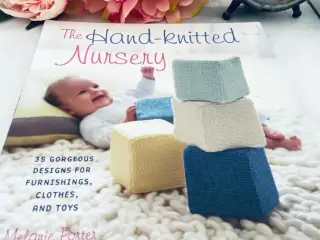 “ the hand-knitted nursery “ Håndarbejdsbog