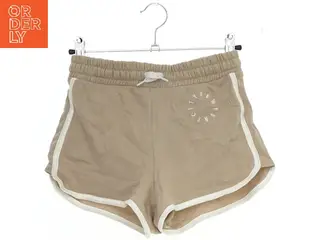 Beige shorts med hvid kant fra H&M (str. 146)