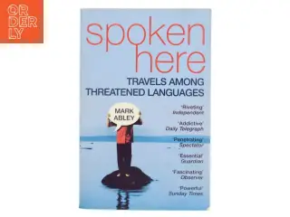 Spoken here : travels among threatened languages af Mark Abley (Bog)