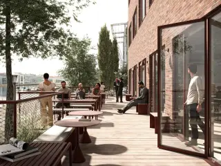 Exceptionel flerbrugerejendom i første parket til vandet