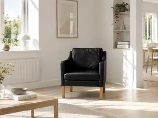 Nielaus lounge stole i sort semi anilin læder.