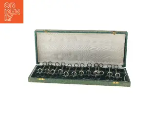 12 stk. Pletsølv franske 1930'er knivholdere (str. 33x13 cm)