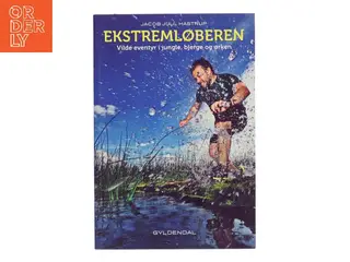 Ekstremløberen : vilde eventyr i jungle, bjerge og ørken af Jacob Juul Hastrup (f. 1970) (Bog)