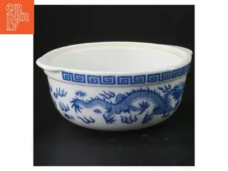 Blå-hvid porcelænsskål med dragemotiv