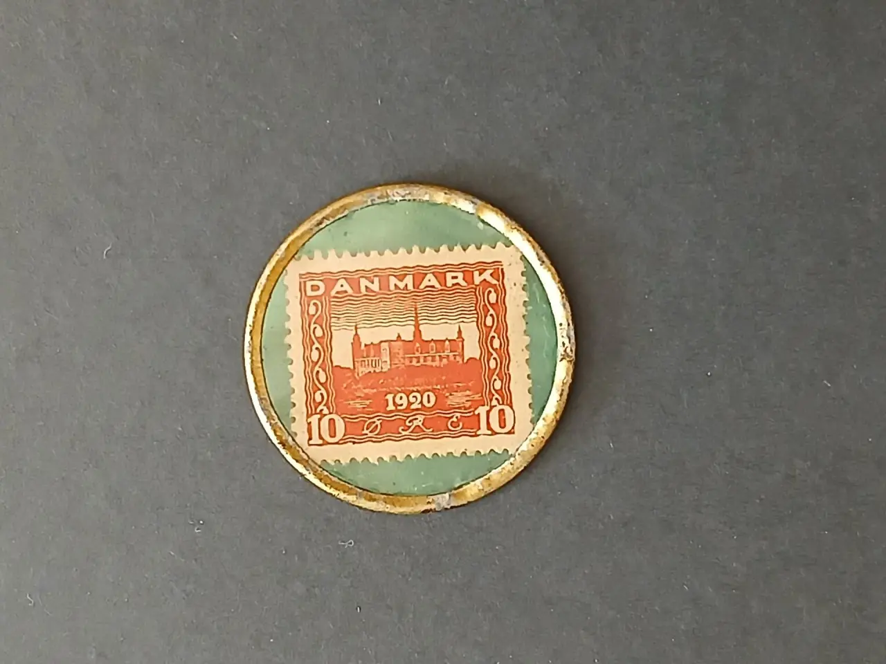 Billede 1 - Postskillemønt  10 Øre Melba fra 1921.  (1+)
