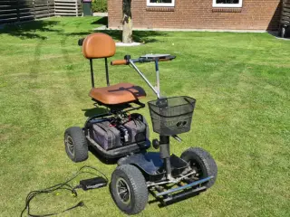 El golfvogn kan trække haveredskaber