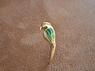 Guldfarvet broche