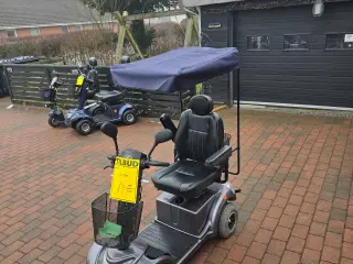 Elscooter med tag på