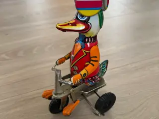 Blikpladelegetøj And på Trehjulet cykel