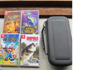 nintendo switch med spil og tilbehør
