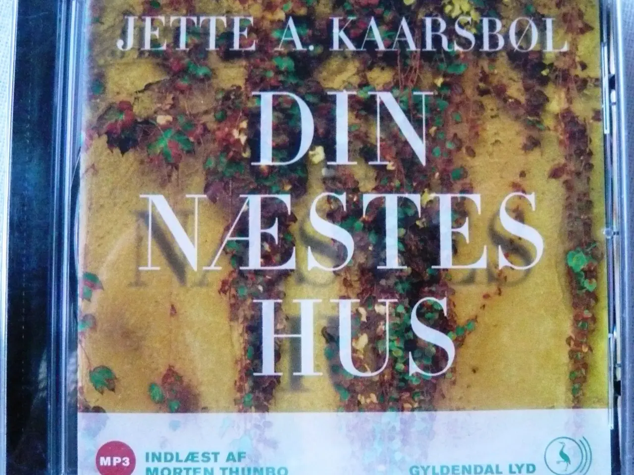 Billede 1 - Lydbog Din næstes hus af Jette A. Kaarsbøl