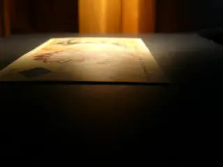 100 seddel. Den første.
