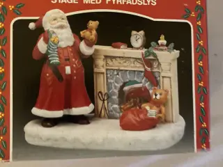 Julefigur nisse ved pejs fyrfadsstage