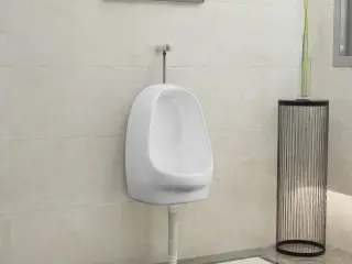 Væghængt urinal med skylleventil i keramik - hvid