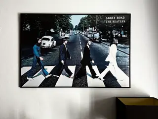 Plakat med Beatles.