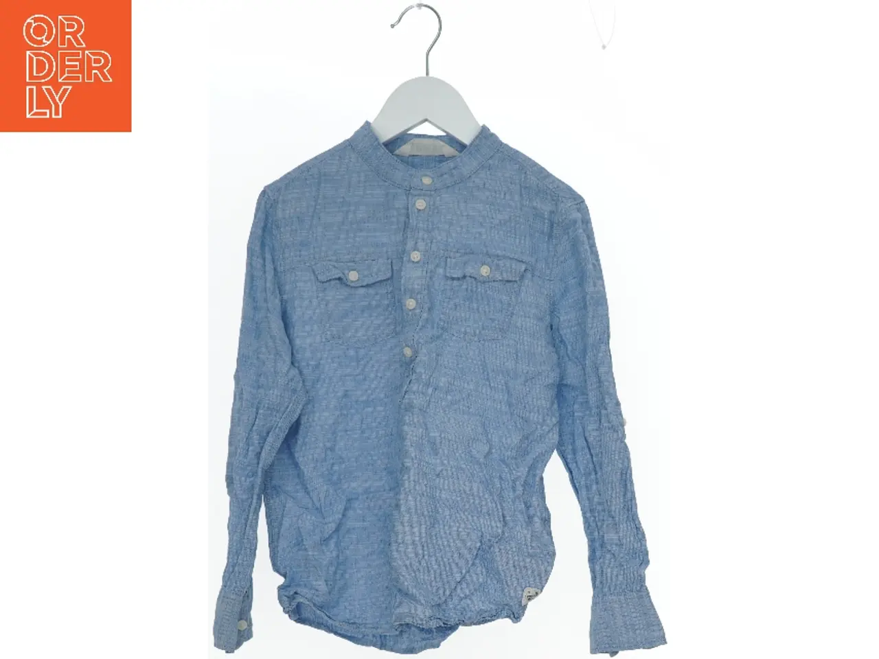 Billede 1 - Lyseblå skjorte med lange ærmer fra H&M (str. 134)