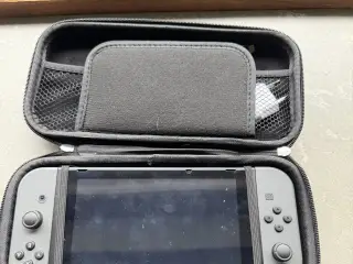 Nintendo switch med spil og tilbehør