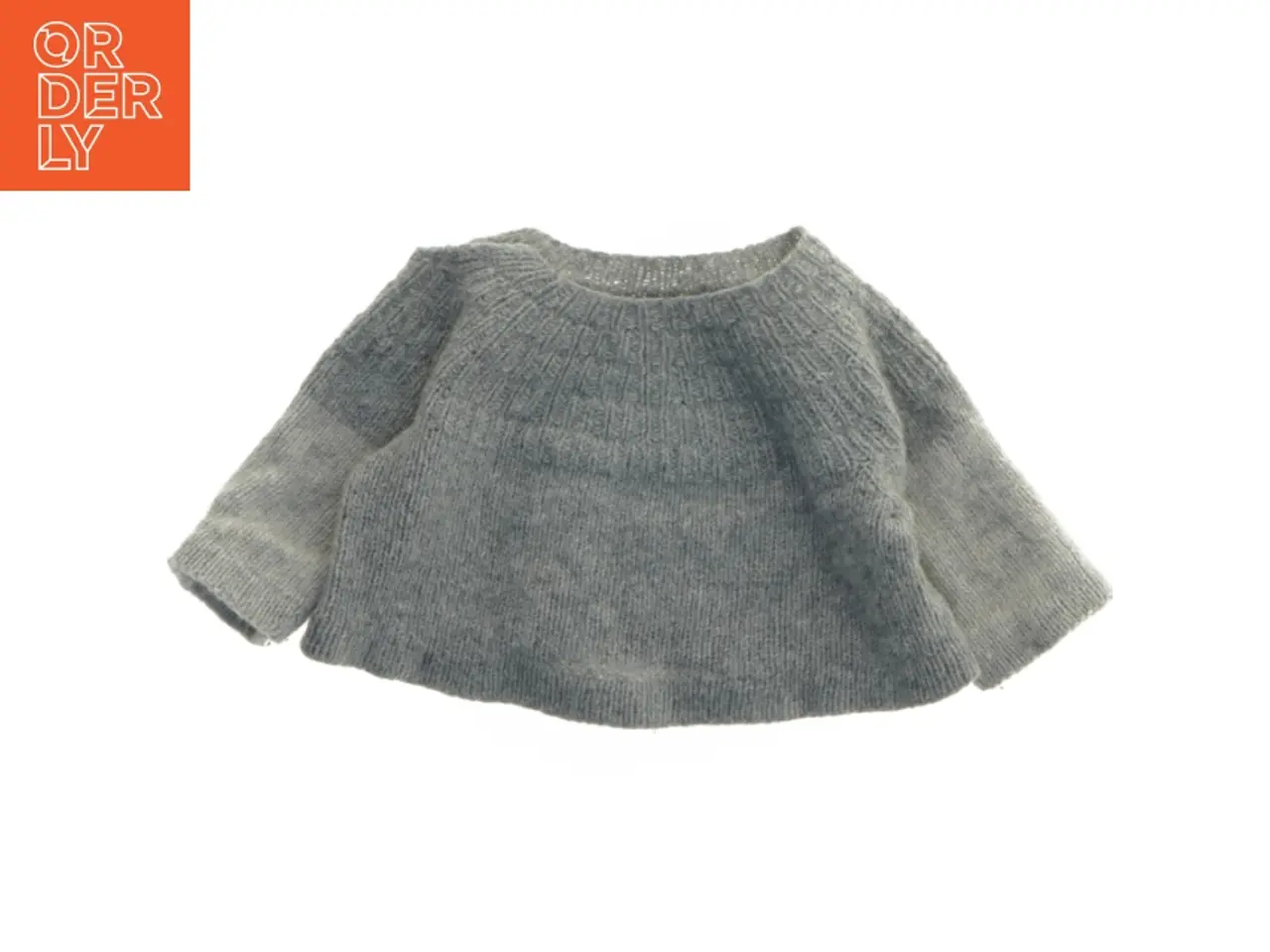 Billede 1 - Strikket babytrøje i ren uld (str. Bryst. 25 cm. længde. 20 cm)