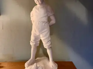 Gipsfigur - dreng med tudse