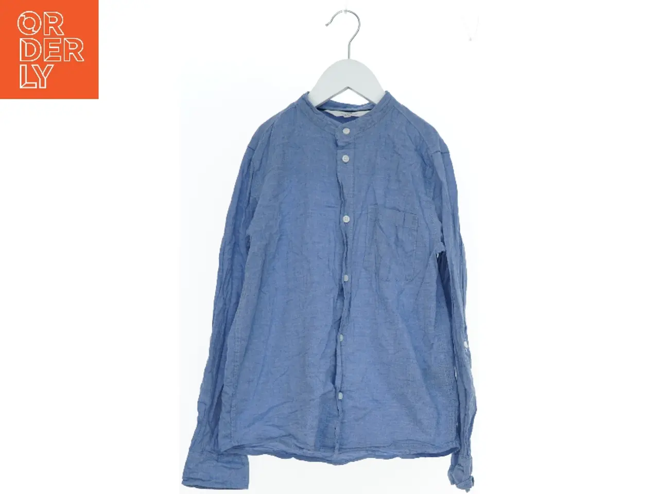 Billede 1 - Lys blå skjorte med lange ærmer fra H&M (str. 140)