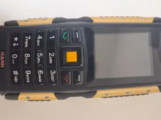 Mann mobil telefon sælges 