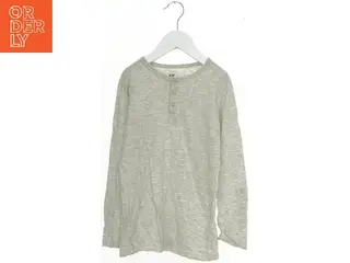 Langærmet trøje med knapper fra H&M (str. 128)