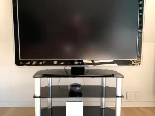 Flot Philips Ambilight TV med bord på hjul