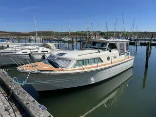 Flot Amerglass motorbåd 32 fod.