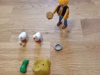 Playmobil pige fodrer hæs