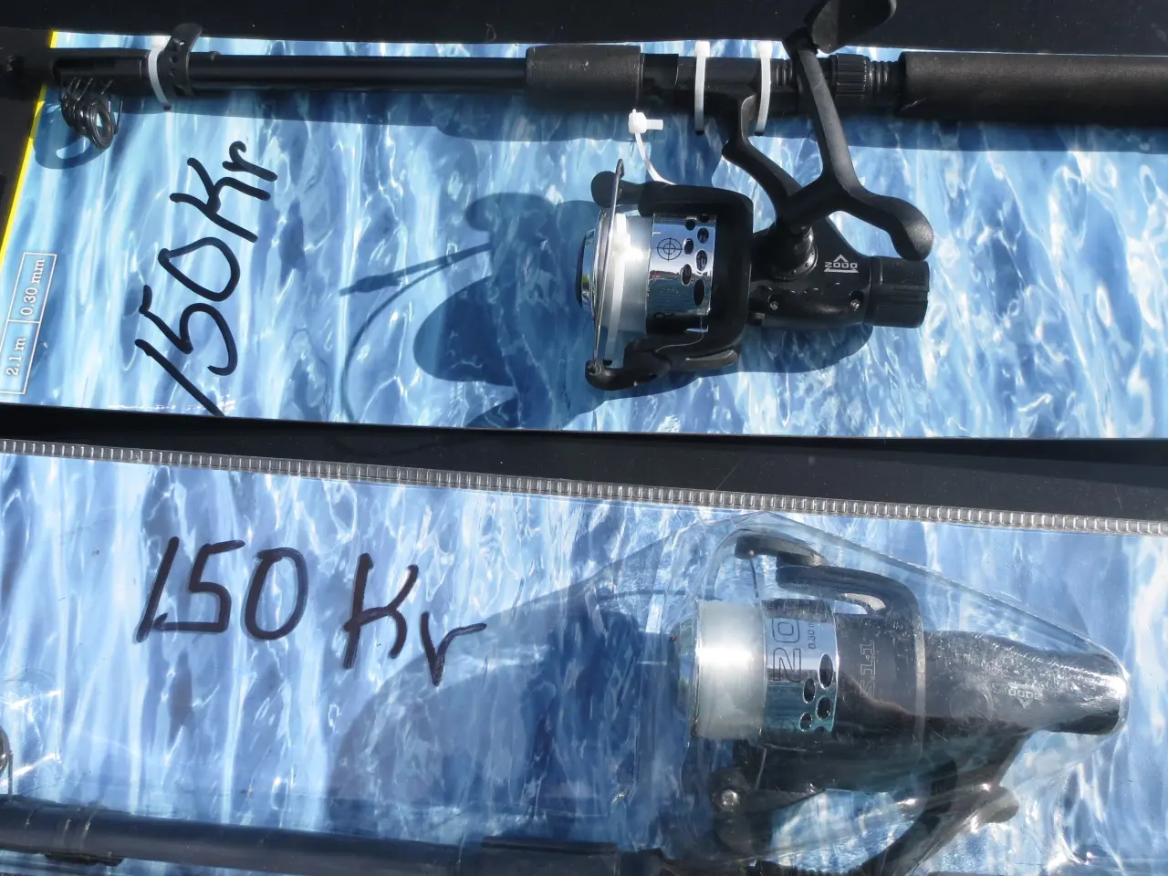 Billede 1 - Fiskestænger Med Hjul 4 Sæt.2 røde sæt,+Div.Knive