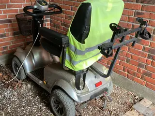 El scooter inklusiv ladekabel