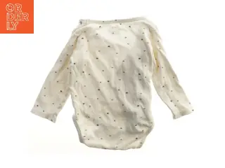 Hvid bodystocking med stjernemønster fra H&M (str. 68)