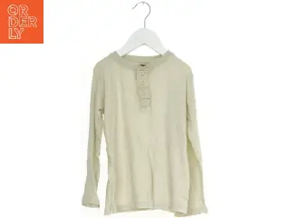 Langærmet bluse med knapper fra H&M (str. 104)