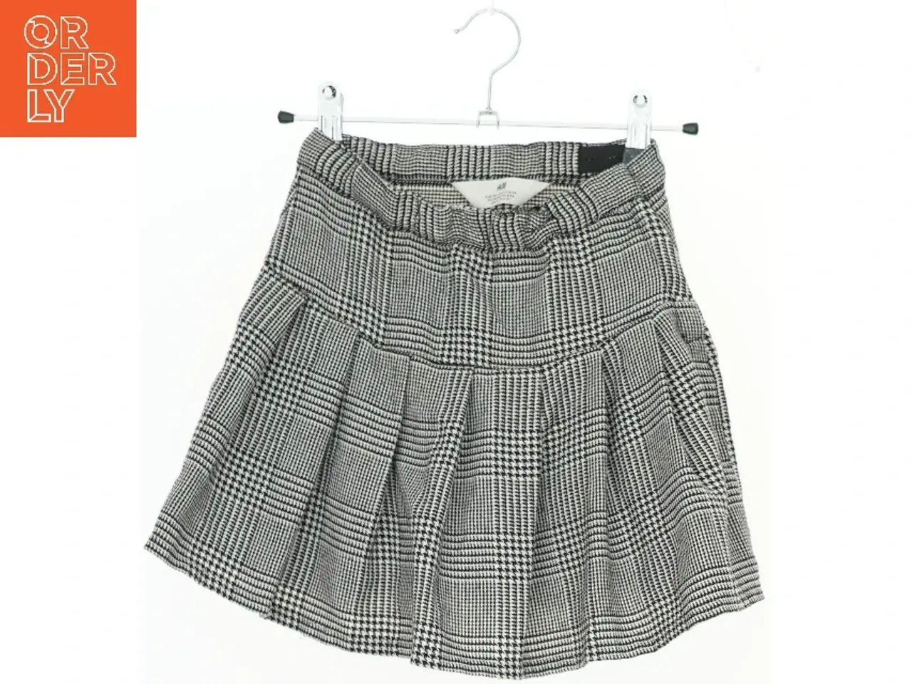 Billede 1 - Ternet nederdel med plisseringer fra H&M (str. 134)