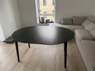 Rundt spisebord med tillægsplader