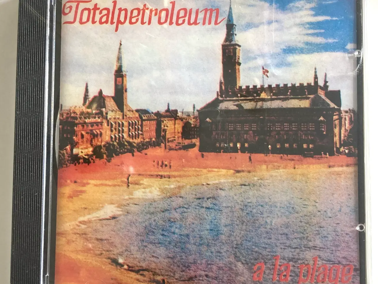 Billede 1 - Totalpetroleum: a la plage – I UBRUDT FOLIE