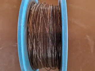 Spole med Metaltråd 0,80 mm. Vægt med spole 2 kg.