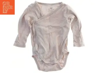 Langærmet bodystocking til baby fra H&M (str. 62)