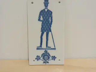 Musselmalet toiletskilt