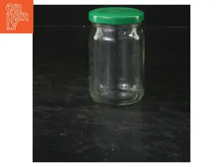 Glasbeholder med grøn låg (str. 10x6 cm)