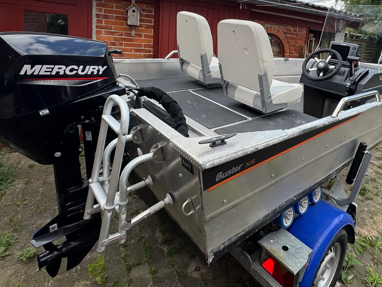 Billede 1 - Minimal brugt Buster xsr med Merc 20 med el tilt