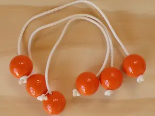 Pastel orange bolas til stigegolf