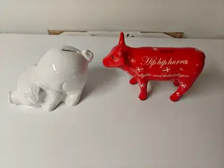 1 sparebøsse, den røde ko er væk