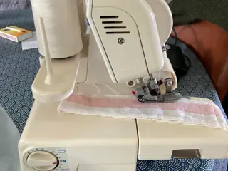 Overlocker god stand
