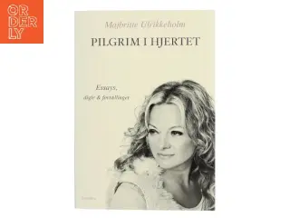 Pilgrim i hjertet : essays, digte og fortællinger af Majbritte Ulrikkeholm (Bog)