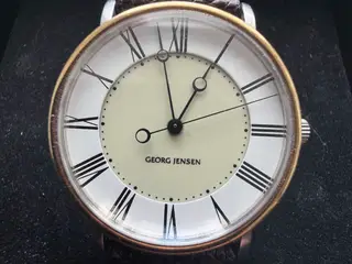 Georg Jensen ur i 18k guld og stål med automatisk