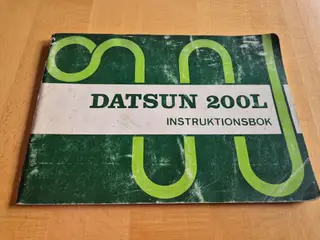 Instruktionsbog DATSUN 200L.