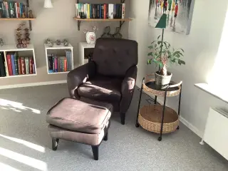 Natuzzi okselæder lænestol med skammel.